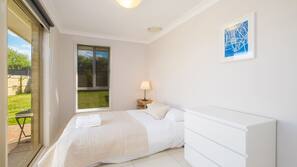 Blackout drapes, free WiFi, linens