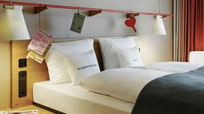 Daunenbettdecken, Minibar, Zimmersafe, individuell eingerichtet