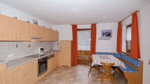 Fridge, stovetop, cookware/dishes/utensils