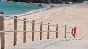 Private beach, white sand, sun loungers, beach umbrellas