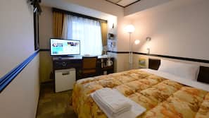 In-room safe, desk, laptop workspace, bed sheets
