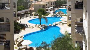 2 outdoor pools, pool umbrellas, pool loungers