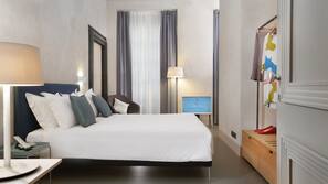 Premium bedding, down duvet, memory foam beds, in-room safe