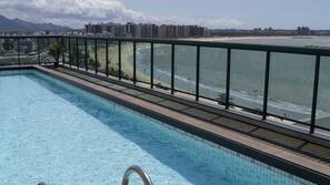 Outdoor pool, pool umbrellas, pool loungers