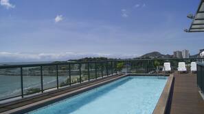 Outdoor pool, pool umbrellas, pool loungers