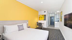 Blackout curtains, iron/ironing board, free WiFi, linens