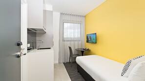 Blackout curtains, iron/ironing board, free WiFi, linens