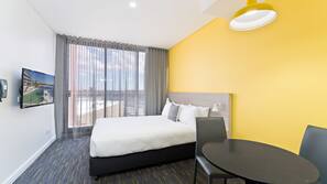 Blackout curtains, iron/ironing board, free WiFi, linens