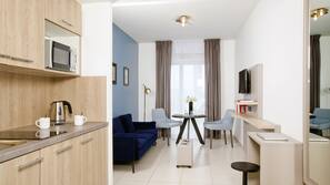 Fridge, microwave, hob, coffee/tea maker