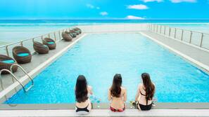 Outdoor pool, pool umbrellas, pool loungers