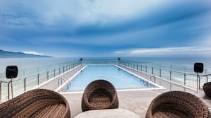 Outdoor pool, pool umbrellas, pool loungers