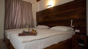Premium bedding, in-room safe, desk, soundproofing