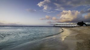 On the beach, white sand, beach towels, snorkelling
