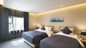 Premium bedding, down comforters, in-room safe, desk