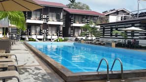 Outdoor pool, pool umbrellas, pool loungers