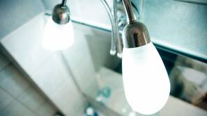 Shower, free toiletries, hair dryer, towels