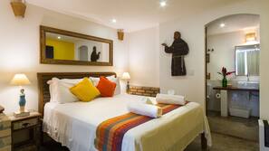 Roupas de cama premium, frigobar, cofres nos quartos
