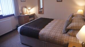 Blackout curtains, iron/ironing board, free WiFi, linens