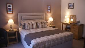 Blackout curtains, iron/ironing board, free WiFi, linens