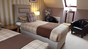 Blackout curtains, iron/ironing board, free WiFi, linens