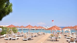 On the beach, free beach shuttle, beach cabanas, sun-loungers