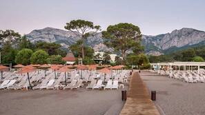 On the beach, free beach shuttle, beach cabanas, sun-loungers