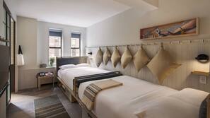Hypo-allergenic bedding, pillow top beds, in-room safe, desk