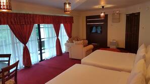Desk, iron/ironing board, linens