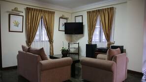32-inch flat-screen TV with cable channels