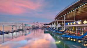 Outdoor pool, pool umbrellas, pool loungers
