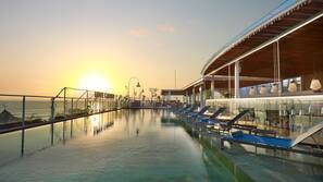 Outdoor pool, pool umbrellas, pool loungers
