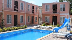Outdoor pool, pool umbrellas, pool loungers
