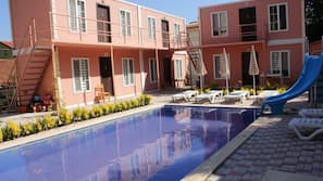 Outdoor pool, pool umbrellas, pool loungers