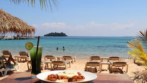 Private beach, white sand, sun-loungers, beach umbrellas