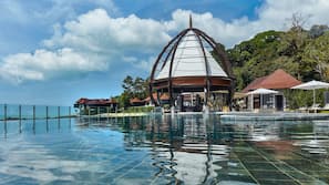 3 outdoor pools, open 7 AM to 7 PM, pool umbrellas, pool loungers