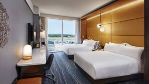 Premium bedding, down comforters, pillowtop beds, in-room safe