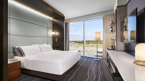 Premium bedding, down comforters, pillowtop beds, in-room safe
