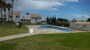 Outdoor pool, pool umbrellas, pool loungers
