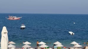 Private beach, sun loungers, beach umbrellas
