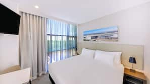 In-room safe, laptop workspace, blackout curtains, soundproofing