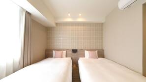 Blackout drapes, iron/ironing board, free WiFi, linens