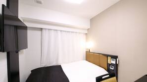 Down comforters, desk, blackout drapes, soundproofing