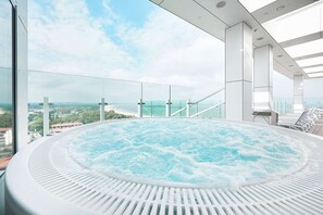 Outdoor pool, sun loungers, lifeguards on site