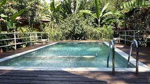 Outdoor pool, pool umbrellas, sun loungers