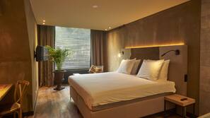 Luxe beddengoed, een kluis op de kamer, verduisterende gordijnen