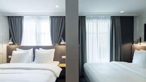 Premium bedding, down comforters, minibar, in-room safe