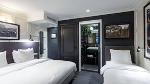 Premium bedding, down comforters, minibar, in-room safe