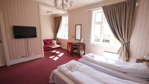 Desk, blackout drapes, iron/ironing board, free WiFi