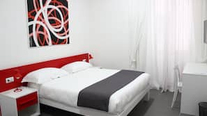 Ropa de cama de alta calidad, minibar, caja fuerte y escritorio
