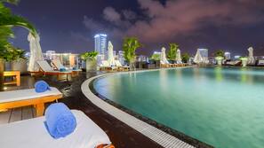 Outdoor pool, pool umbrellas, sun loungers